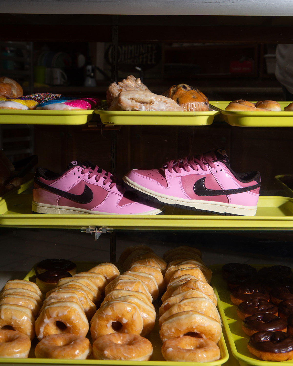 Rukus Made Swoosh-Shaped Donuts For Their Nike Dunk Low Drop